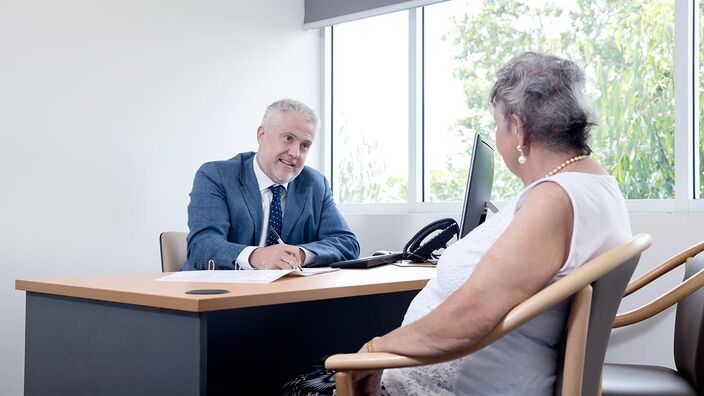 Doctor Consulting an Elderly patient